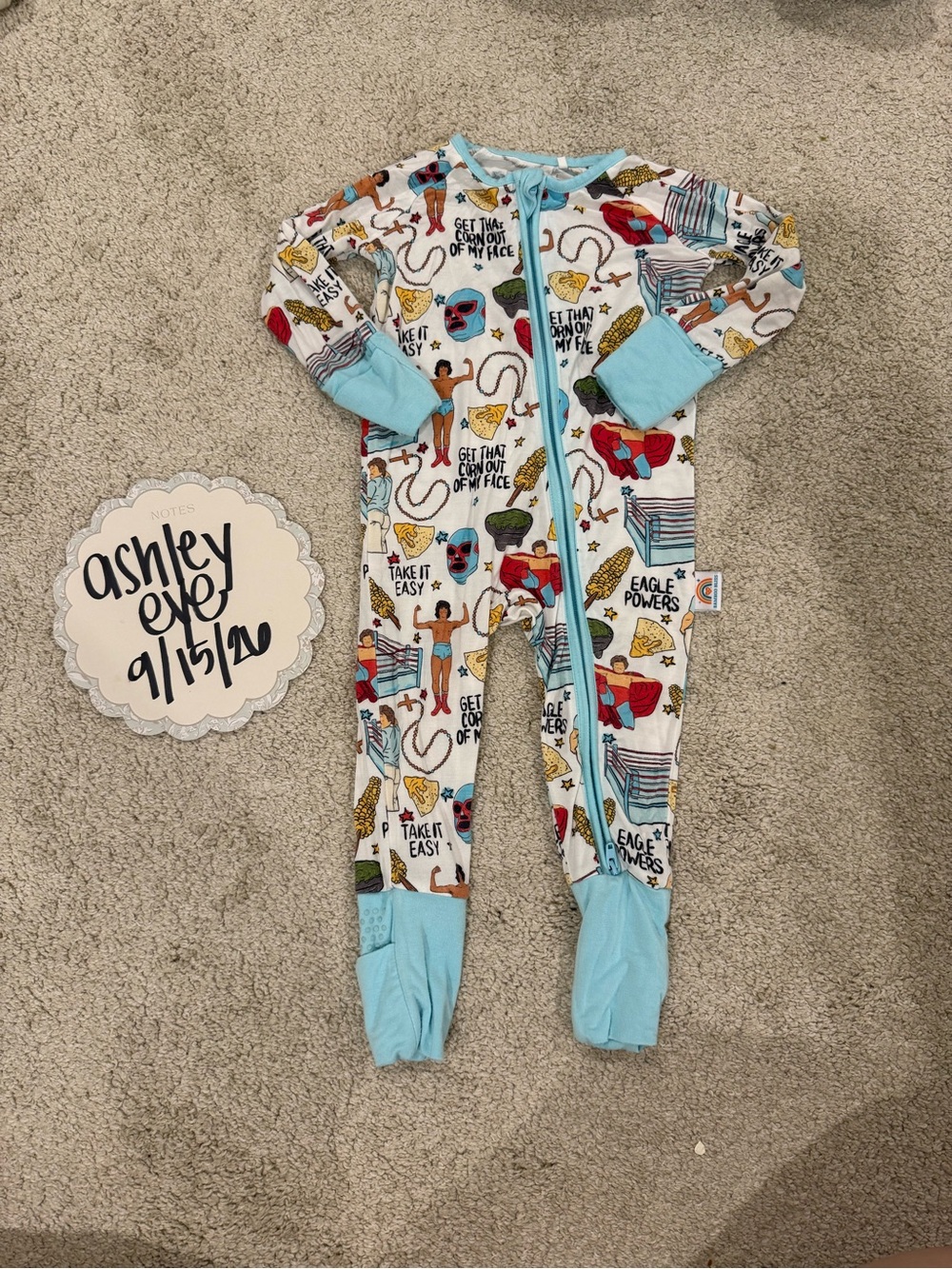 Light Blue Trim Kids One-Piece Footed Pajamas with Playful Multi-Print